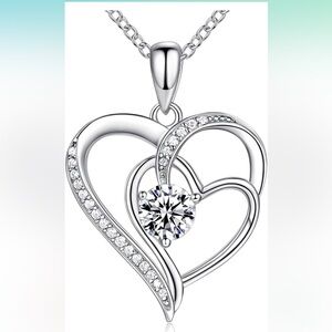 OR Old Rubin Sterling Silver heart pendant with cubic zirconia.
